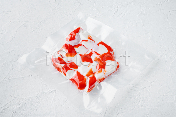 신선 사람없음 JPG 포토 하이앵글 해외이미지 맛살 비닐포장 식재료 실내 진공 진공포장 흰배경