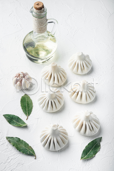 사람없음 JPG 포토 해외이미지 마늘 만두 실내 올리브오일 월계수잎 유리병 흰배경