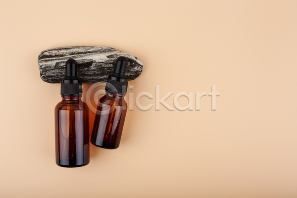 사람없음 JPG 포토 하이앵글 해외이미지 돌(바위) 베이지색배경 실내 에센스 카피스페이스 피부관리 화장품