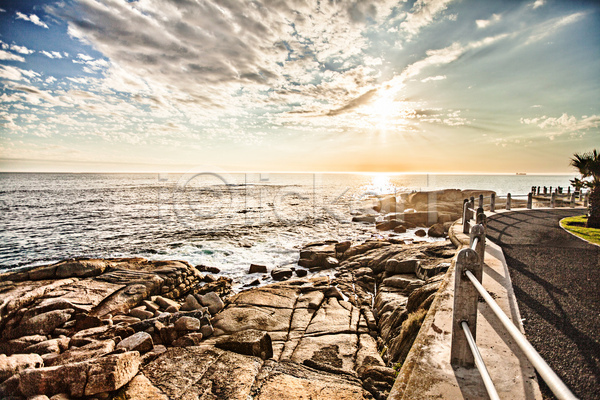 사람없음 JPG 포토 해외이미지 돌(바위) 바다 야외 울타리 주간 태양 풍경(경치) 하늘 햇빛