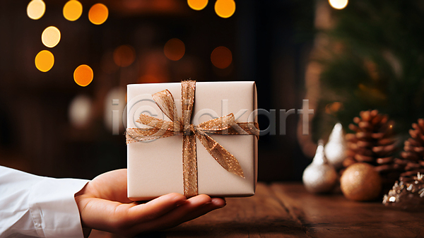 신체부위 JPG 편집이미지 들기 리본 베이지색 보케 보케백그라운드 선물 선물상자 손 종이 크리스마스장식
