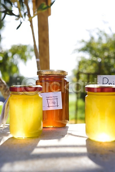 사람없음 JPG 근접촬영 아웃포커스 포토 꿀 나무 노란색 백그라운드 병(담는) 쇼핑 식물 야외 유기농 유리병 음식 주간