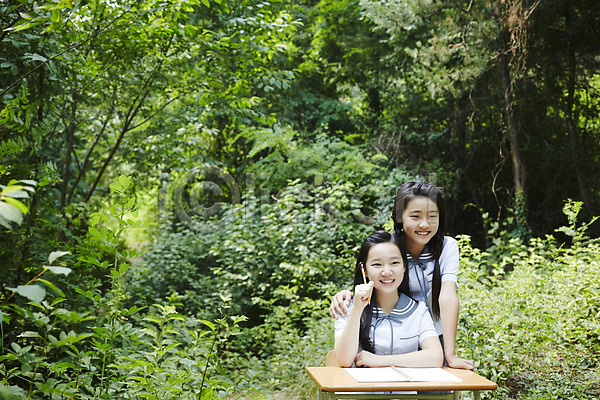 우정 10대 고등학생 동양인 두명 사람 십대만 십대여자만 여자 여자만 한국인 JPG 포토 공책 교복 남산 들기 미소(표정) 상반신 서기 서울 숲 앉기 야외 양갈래머리 여고생 여학생 연필 주간 책상 친구 한국